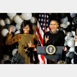 反トランプが担ぎ出す（オバマ米大統領とミシェル夫人）／（Ｃ）ロイター