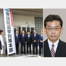 ２６日、看板掛けを行った公明党（右は竹内真二氏）／（Ｃ）共同通信社