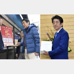 消費税10％の増税は強行、かたや税金の無駄遣いは１００２億円（会計検査院の決算検査報告書を持つ安倍首相＝右）／（Ｃ）共同通信社