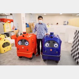 無人宅配ロボ「デリロ」とZMP社の谷口恒社長（写真）小沢コージ