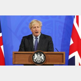 「津波が来る」と、ジョンソン英首相（Ｃ）ロイター＝共同