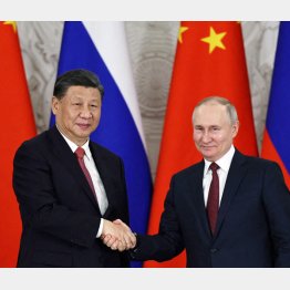 やけに和やかな中ロ首脳会談。始終笑顔を絶やさないロシアのプーチン大統領（Ｃ）ロイター／ Sputnik