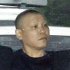 送検のため神戸・長田署を出る菱川龍己容疑者＝24日（Ｃ）共同通信社