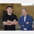 湊川親方（元大関貴景勝）と元NHKアナの吉田賢氏（Ｃ）日刊ゲンダイ